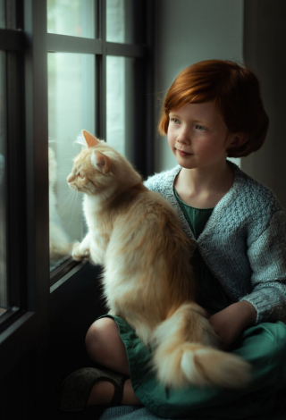 Illustration de l'article : Cette photographe réalise des photos poétiques qui montrent la beauté du lien entre chien et enfant