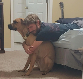 Illustration de l'article : 9 photos montrant l’amour formidable entre les chiens et les pères de famille